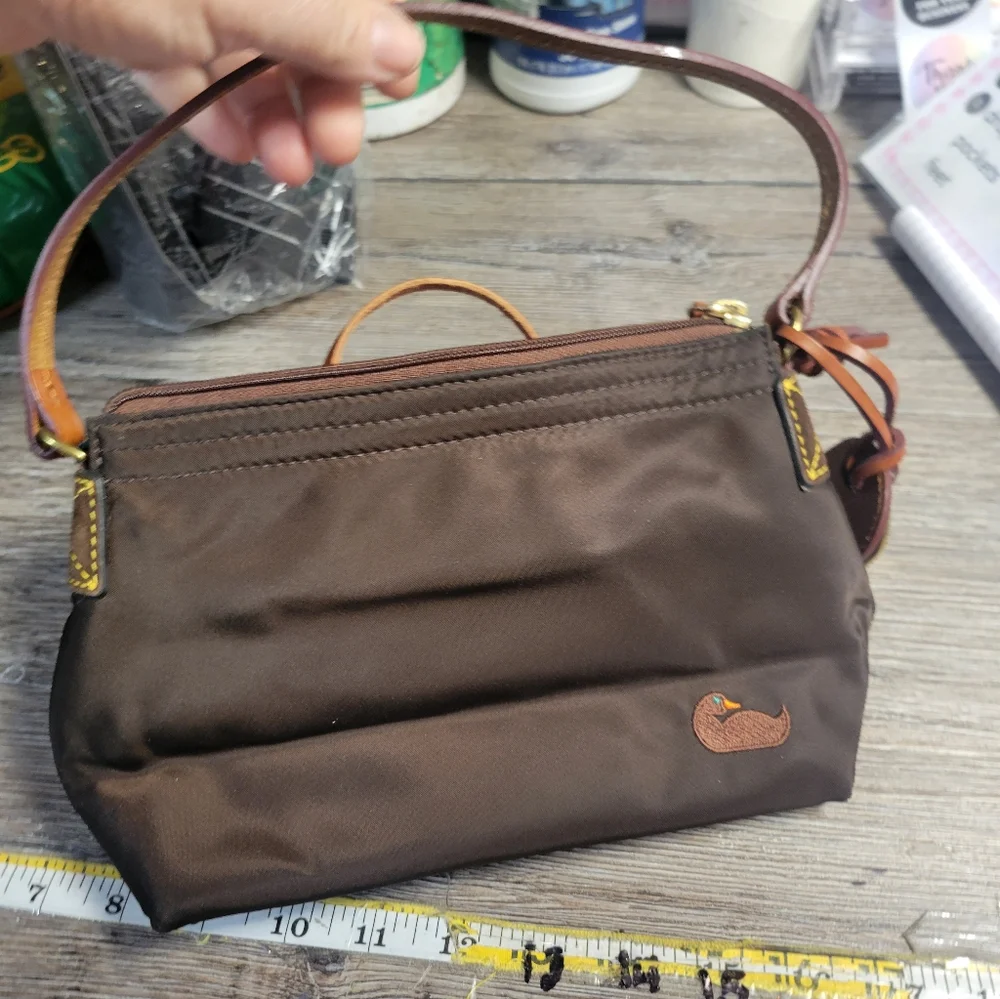 Dooney and Bourke Brown nylon Hand bag‎